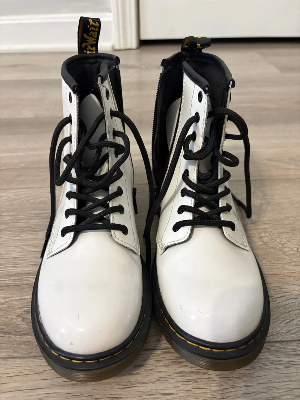 Dr. Martens White Patent Lace-Up Boots with Black Trim